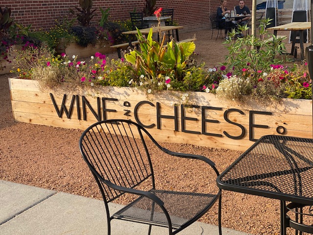 The Wine & Cheese outdoor patio sign