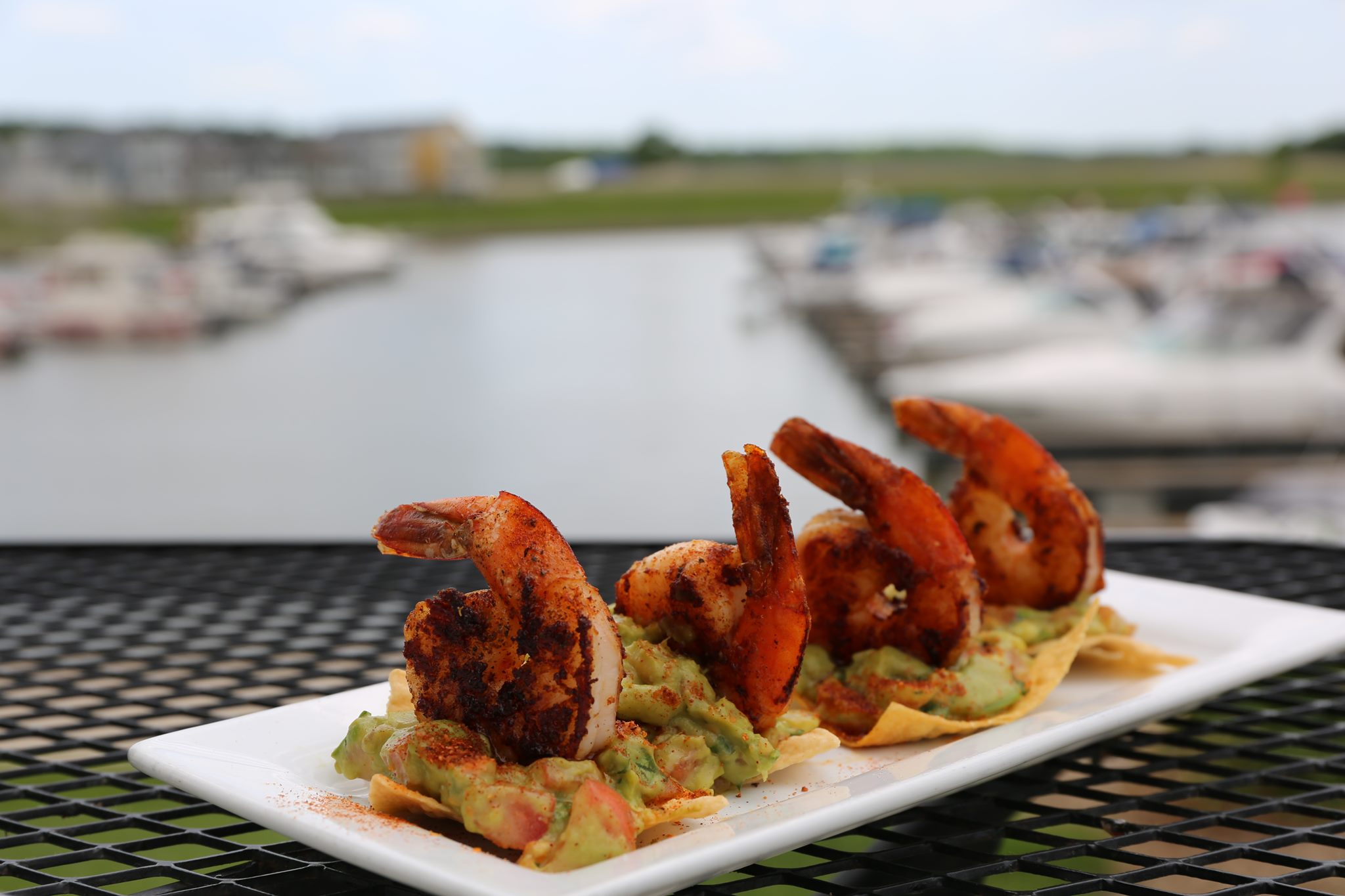 shrimp nachos by the water