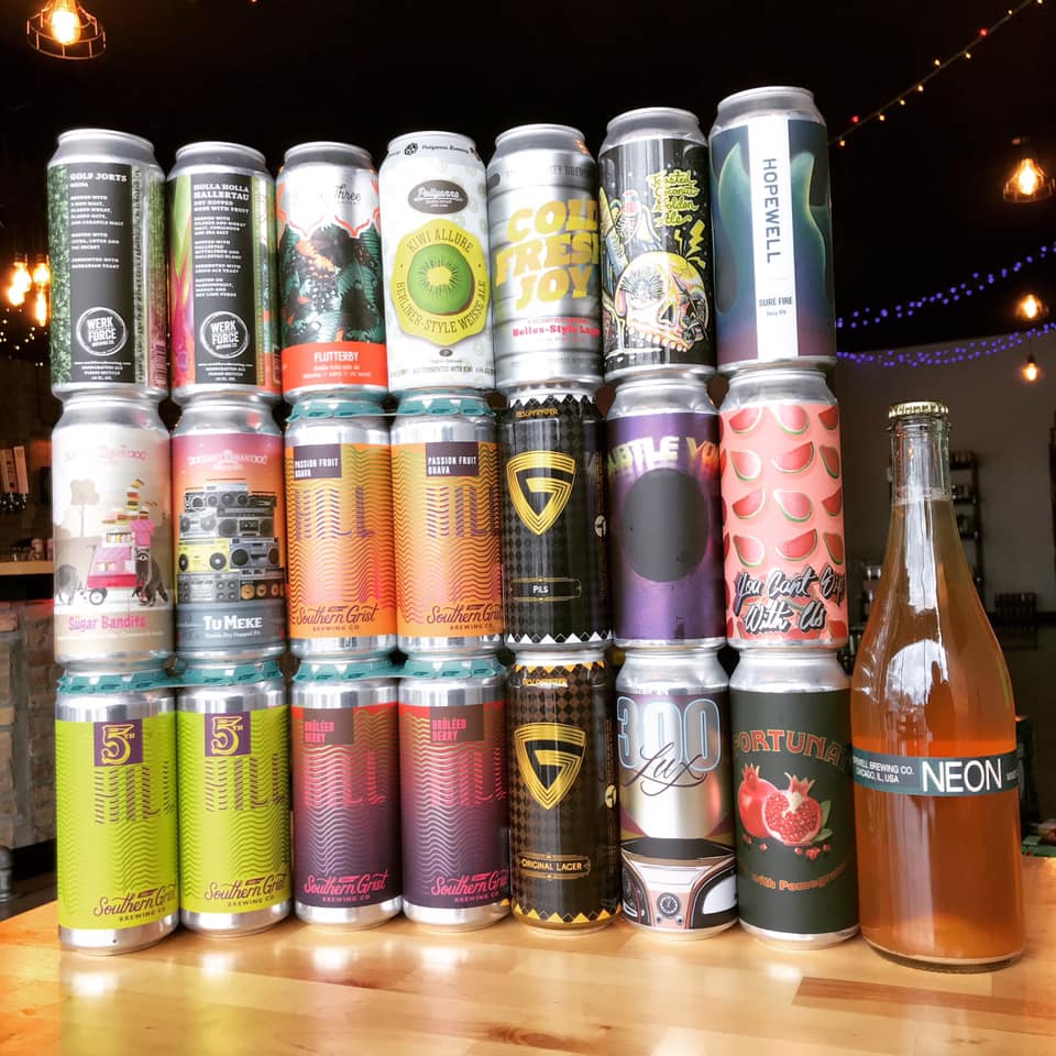 many cans and bottles from Orange & Brew