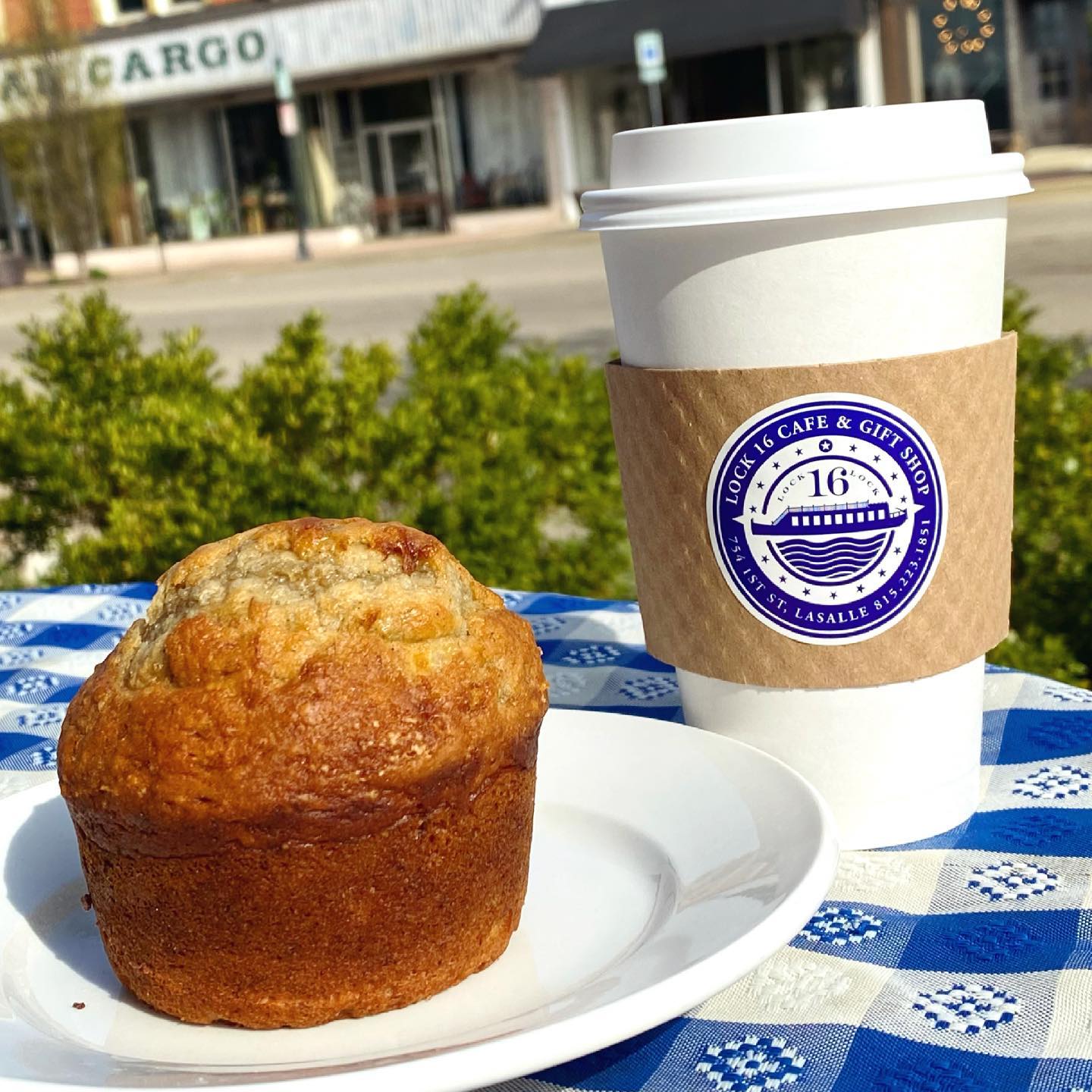 a muffin and a cup of coffee
