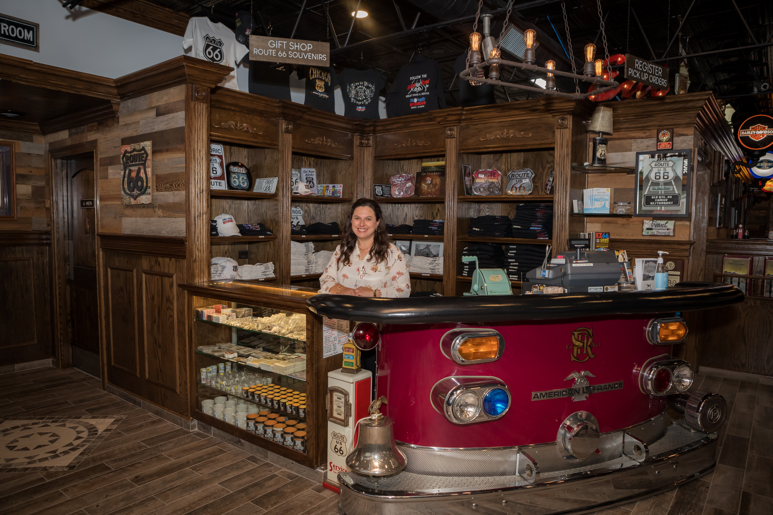 Maria Ahmedi posting inside of her restaurant
