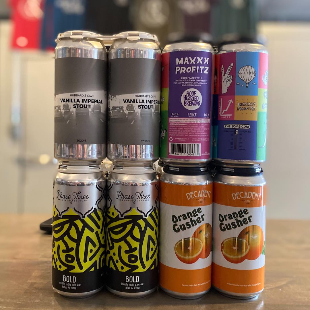 Cans from Hubbard's Cave, Hoof Hearted, Phase Three, and Decadent Ales at Iron&Glass Romeoville