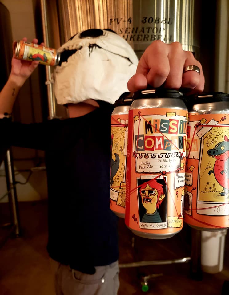Missing companion four pack, held by a guy in a jack skellington-type mask