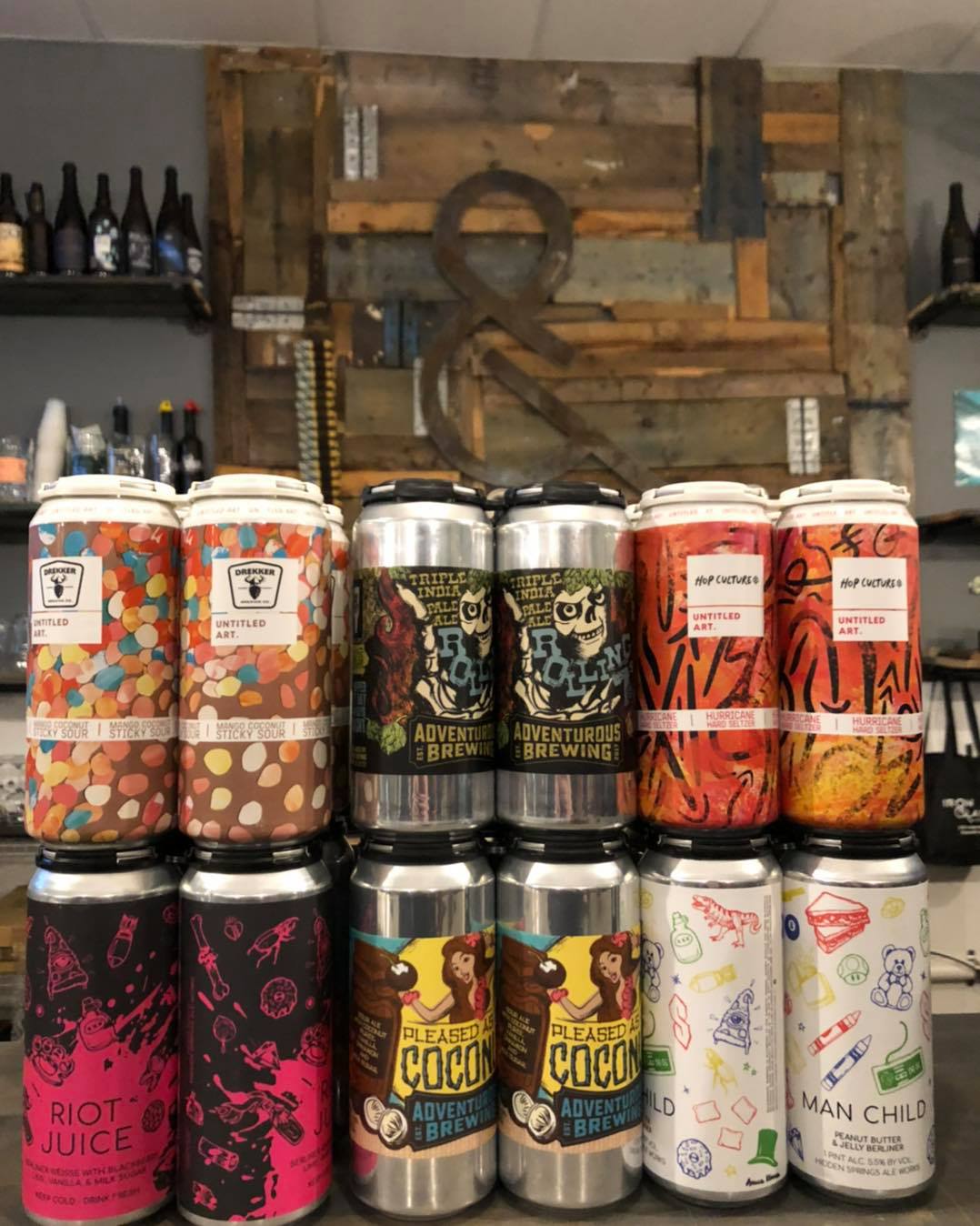 SEveral cans of beer at Iron&Glass Romeoville