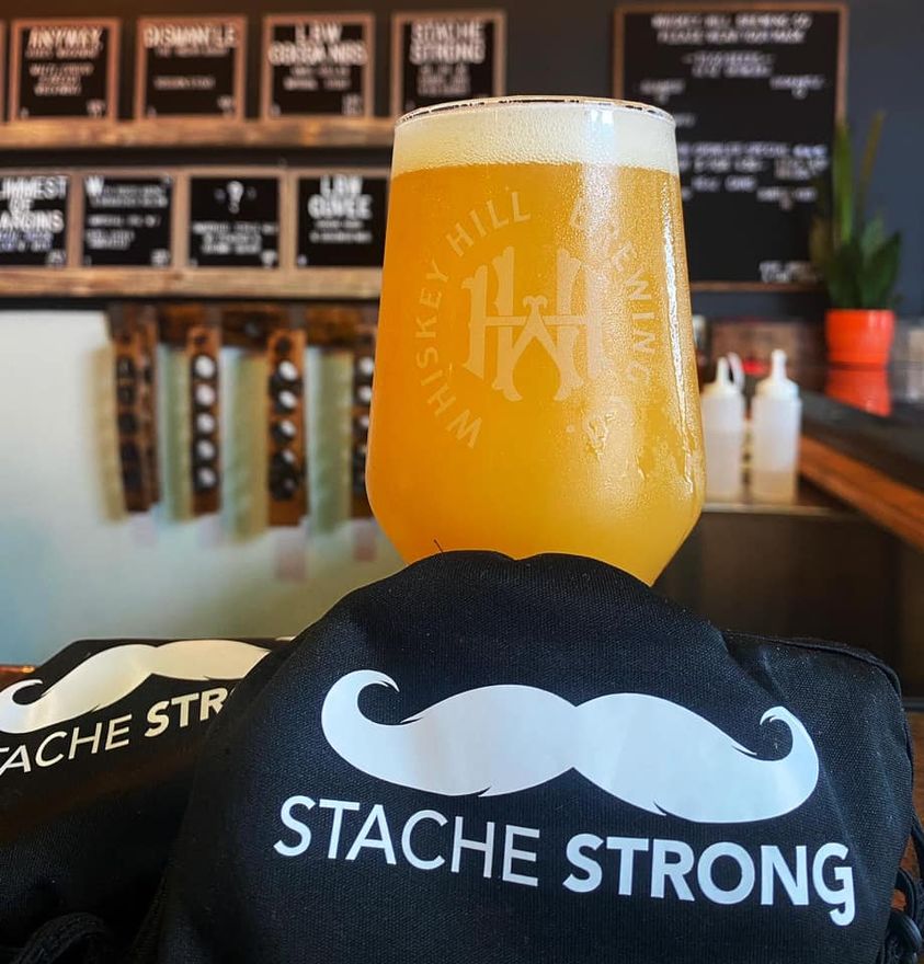 Glass of Stache Strong
