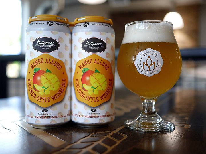 Cans and a glass of Pollyanna's Mango Allure
