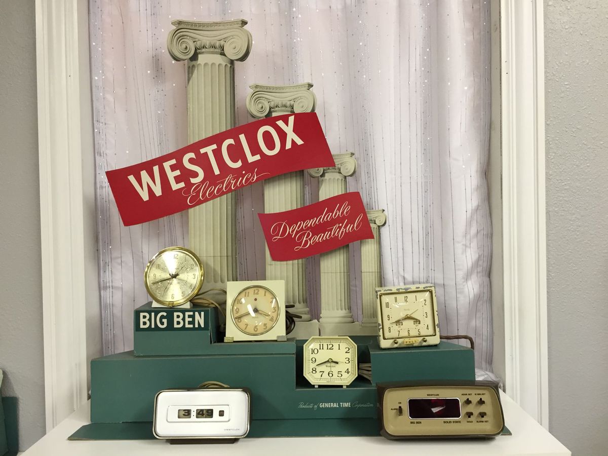 Westclox museum image with historical artifacts in display case