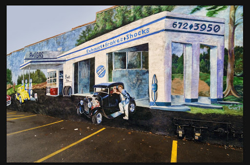 Murals of old gas station in Streator, IL